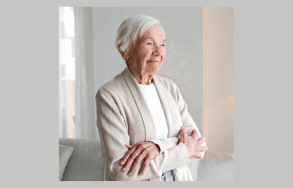 older woman with crossed arms