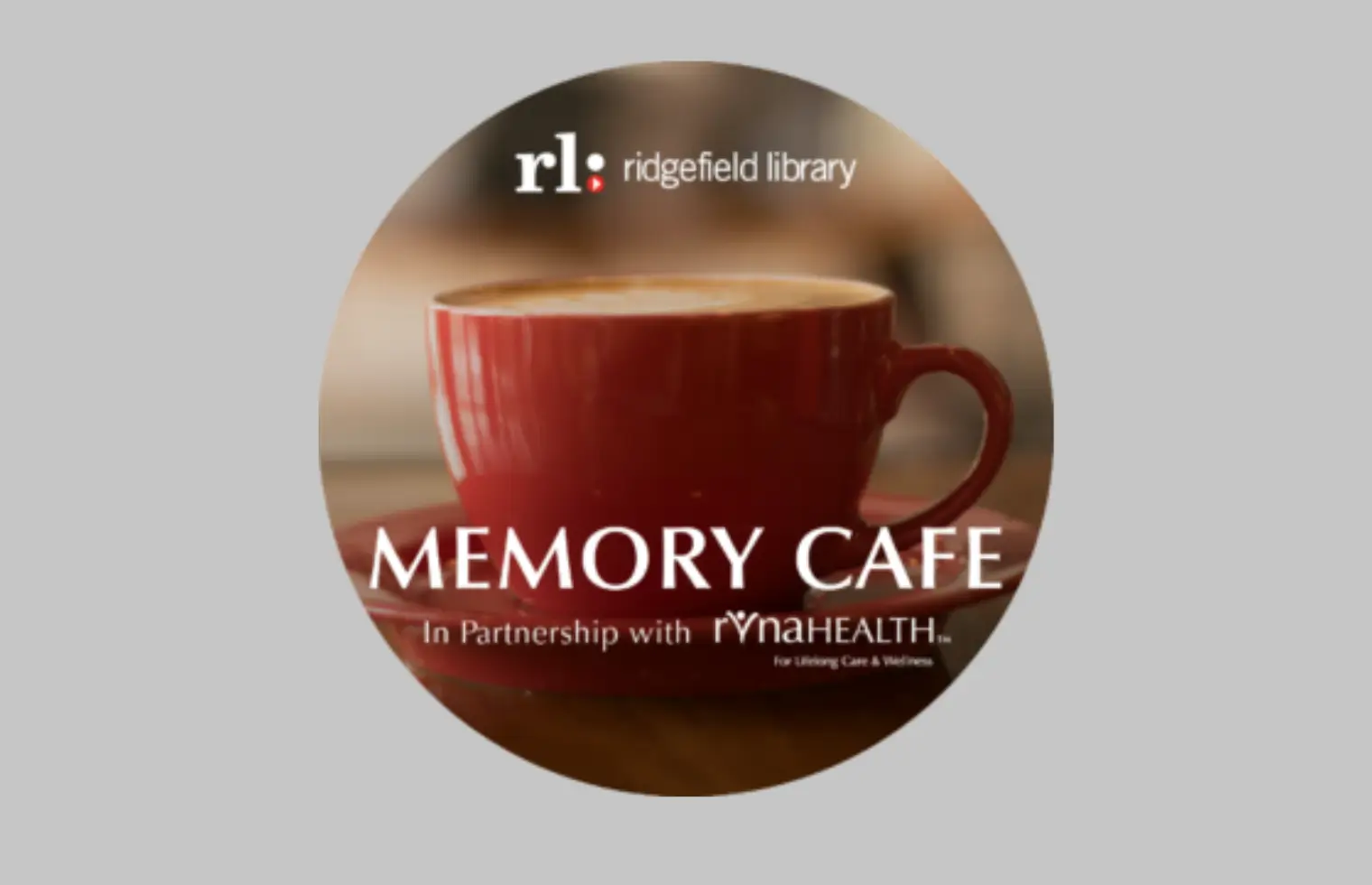 red coffee cup behind the words Memory Cafe