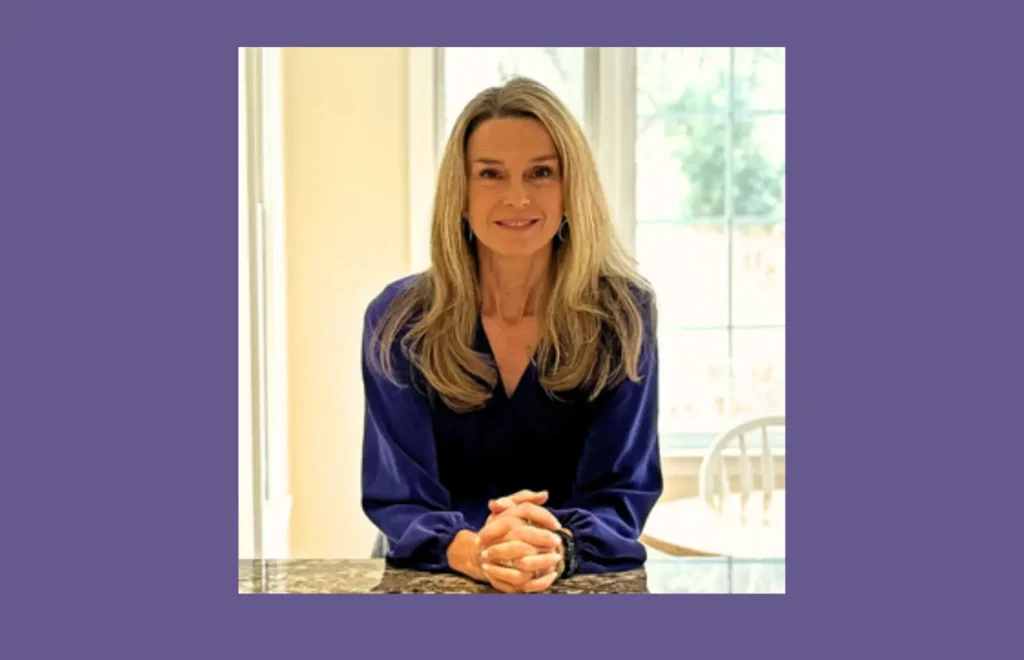 woman wearing a purple blouse